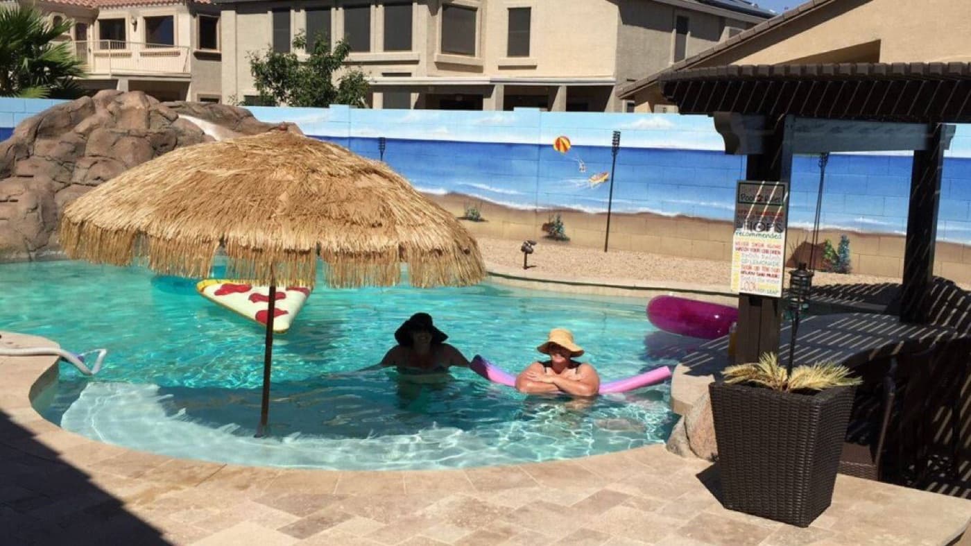 Family enjoying a Maricopa Pools backyard